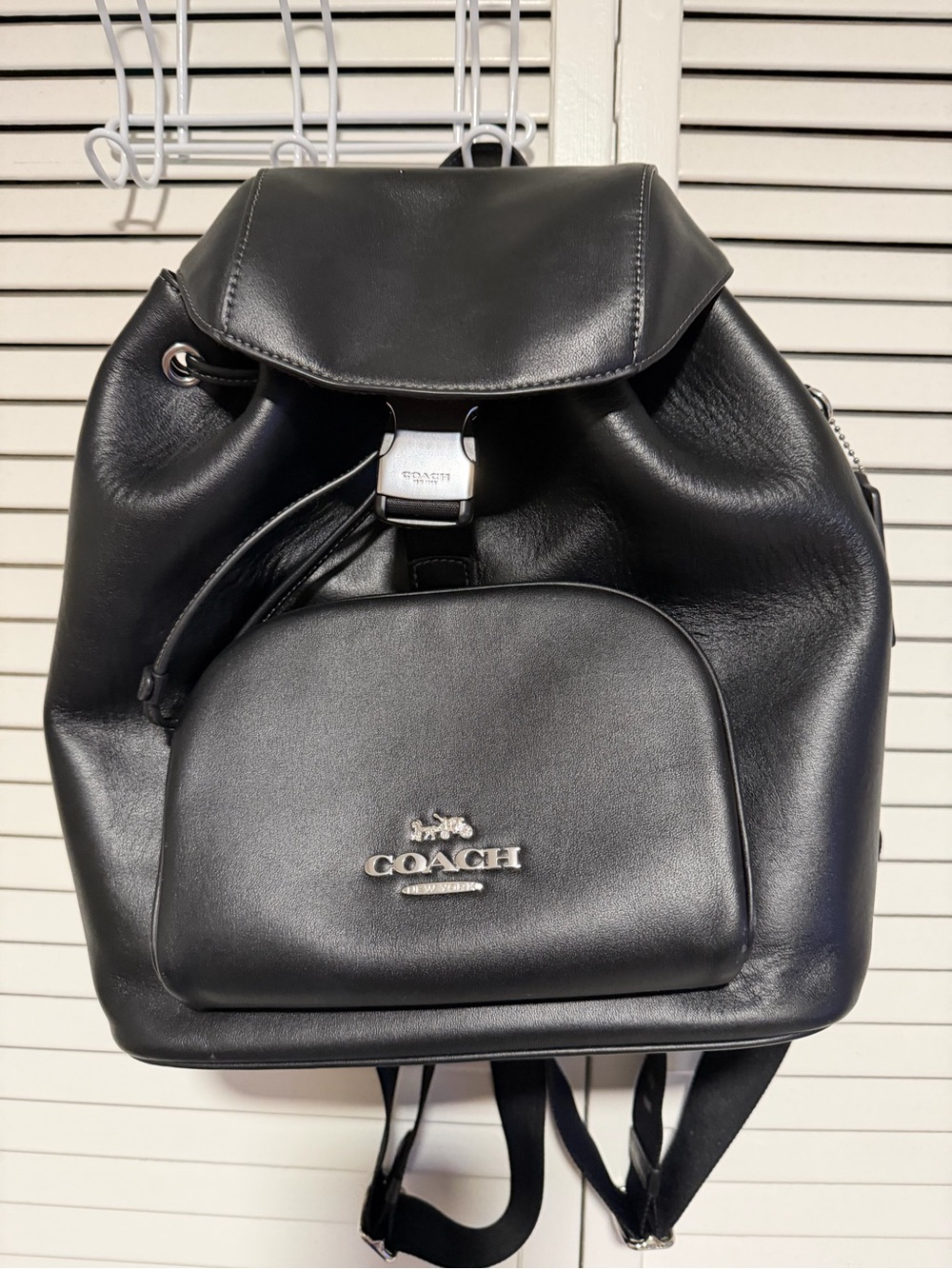 Coach Black Leather Drawstring Backpack with Front Zip Pocket